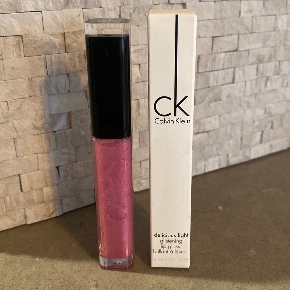 Calvin Klein Delicious Light Lip Gloss in Knockout. NEW
